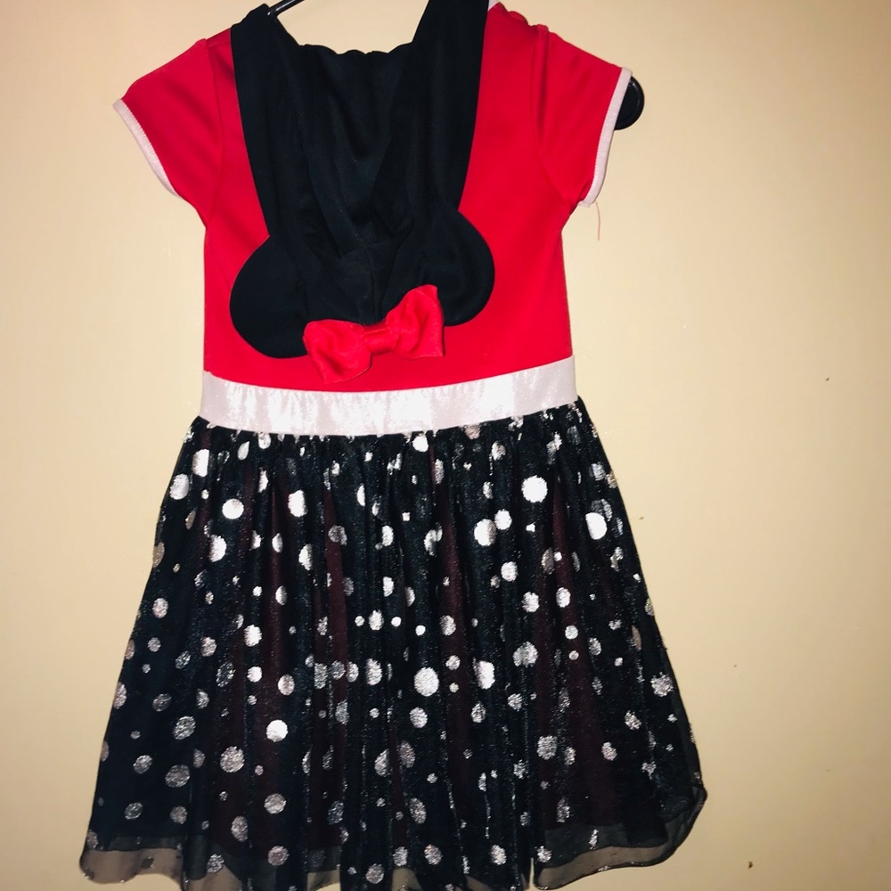 Minnie Mouse dress with Minnie ears. In very good condition with no holes